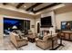 Bright living room with fireplace and sliding glass doors leading to patio and mountain views at 10585 E Crescent Moon Dr # 19, Scottsdale, AZ 85262