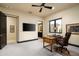 Home office with a desk, chair, and plenty of natural light at 10585 E Crescent Moon Dr # 19, Scottsdale, AZ 85262