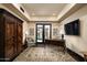 Home office with built-in desk and backyard access at 10585 E Crescent Moon Dr # 19, Scottsdale, AZ 85262