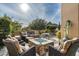 Outdoor patio with fire pit and seating area at 10585 E Crescent Moon Dr # 19, Scottsdale, AZ 85262