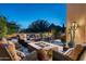 Relaxing patio featuring a fire pit and comfortable seating at 10585 E Crescent Moon Dr # 19, Scottsdale, AZ 85262