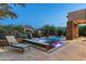 Luxury pool and spa area with mountain views at 10585 E Crescent Moon Dr # 19, Scottsdale, AZ 85262