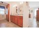 Double vanity bathroom with granite countertop at 10701 W Pineaire Dr, Sun City, AZ 85351