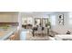 Open concept dining room with sliding glass doors leading to backyard at 12539 W Parkway Ln, Avondale, AZ 85323
