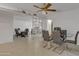 Dining room with glass table and ceiling fan at 15825 N 110Th Ave, Sun City, AZ 85351