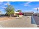 Attractive curb appeal with a long driveway and lush landscaping at 15825 N 110Th Ave, Sun City, AZ 85351