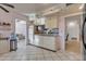 Bright kitchen with granite countertops and yellow cabinets at 15825 N 110Th Ave, Sun City, AZ 85351