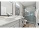 Modern bathroom with double vanity and walk-in shower at 1714 E Saltsage Dr, Phoenix, AZ 85048