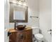 Elegant bathroom with copper sink and ornate mirror at 1714 E Saltsage Dr, Phoenix, AZ 85048
