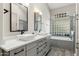 Modern bathroom with double vanity and large shower at 1714 E Saltsage Dr, Phoenix, AZ 85048