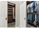 Large walk-in closet with ample shelving and hanging space at 1714 E Saltsage Dr, Phoenix, AZ 85048
