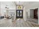Bright and spacious entryway with elegant double doors and hardwood floors at 1714 E Saltsage Dr, Phoenix, AZ 85048