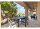 Outdoor patio with seating area and view of pool at 1714 E Saltsage Dr, Phoenix, AZ 85048