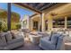 Spacious patio perfect for entertaining, with fire pit and seating at 189 E Atacama Ln, Queen Creek, AZ 85140