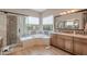 Elegant bathroom featuring a soaking tub and walk-in shower at 189 E Atacama Ln, Queen Creek, AZ 85140