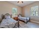 Guest bedroom with twin beds and neutral decor at 189 E Atacama Ln, Queen Creek, AZ 85140