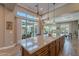 Large kitchen island with ample counter space and modern cabinetry at 189 E Atacama Ln, Queen Creek, AZ 85140