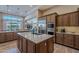 Large kitchen with wood cabinets and granite countertops at 189 E Atacama Ln, Queen Creek, AZ 85140