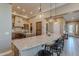 Breakfast bar with seating overlooking the kitchen at 189 E Atacama Ln, Queen Creek, AZ 85140