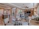 Open concept living room and kitchen with hardwood floors at 189 E Atacama Ln, Queen Creek, AZ 85140