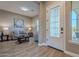 Bright living room with hardwood floors and neutral decor at 189 E Atacama Ln, Queen Creek, AZ 85140