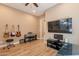 Music room with instruments and a large TV at 189 E Atacama Ln, Queen Creek, AZ 85140