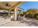 Relaxing outdoor patio with seating, fire pit and pergola at 189 E Atacama Ln, Queen Creek, AZ 85140