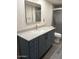 Bathroom features vanity sink with mirror and walk-in shower at 1920 W Lindner W Ave # 108, Mesa, AZ 85202