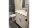 Bathroom featuring gray countertops, white vanity, and white toilet and shower at 1920 W Lindner W Ave # 108, Mesa, AZ 85202