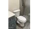 Bathroom features toilet and walk-in shower with glass door at 1920 W Lindner W Ave # 108, Mesa, AZ 85202