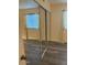 This bedroom features wood-look floors, a closet with mirrored doors and two windows at 1920 W Lindner W Ave # 108, Mesa, AZ 85202