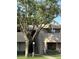 Inviting two-story condo with charming exterior details and a well-maintained front yard at 1920 W Lindner W Ave # 108, Mesa, AZ 85202