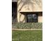 Exterior view of building with artificial hedge and stairs at 1920 W Lindner W Ave # 108, Mesa, AZ 85202