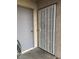 Secure front door with stylish security screen and additional locked storage for convenience at 1920 W Lindner W Ave # 108, Mesa, AZ 85202