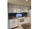 Bright kitchen features white appliances, granite countertops and ample cabinet space at 1920 W Lindner W Ave # 108, Mesa, AZ 85202