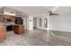 Kitchen with granite countertops and dark wood cabinets at 2002 N Central Dr, Chandler, AZ 85224