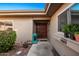 Inviting front entry with double doors and landscaping at 25239 S Glenburn Dr, Sun Lakes, AZ 85248