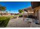 Private patio, covered area, and small backyard at 25239 S Glenburn Dr, Sun Lakes, AZ 85248