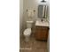 Small bathroom featuring a vanity with modern fixtures, tile floor, and clean design at 4213 E Edgemont Ave, Phoenix, AZ 85008