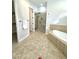 Bathroom with soaking tub and walk-in shower at 4213 E Edgemont Ave, Phoenix, AZ 85008