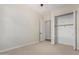 Spacious bedroom with carpeted floor and large closet at 4213 E Edgemont Ave, Phoenix, AZ 85008