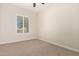Well-lit bedroom with carpet flooring at 4213 E Edgemont Ave, Phoenix, AZ 85008