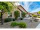 Single-story home with landscaped front yard, stone accents, and a two-car garage at 4213 E Edgemont Ave, Phoenix, AZ 85008