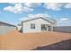 Home features a large backyard and patio at 4235 E Brook Lynn Pl, San Tan Valley, AZ 85143