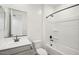Clean bathroom with gray vanity, bathtub, and shower at 4235 E Brook Lynn Pl, San Tan Valley, AZ 85143
