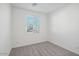 Spacious bedroom with neutral carpeting and large window at 4235 E Brook Lynn Pl, San Tan Valley, AZ 85143