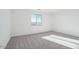 Bright bedroom with carpet and large window at 4235 E Brook Lynn Pl, San Tan Valley, AZ 85143