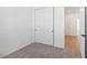 Bright bedroom with double door closet and neutral carpeting at 4235 E Brook Lynn Pl, San Tan Valley, AZ 85143