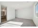 Spacious bedroom with carpet and bathroom access at 4235 E Brook Lynn Pl, San Tan Valley, AZ 85143