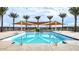 Community pool with shade structures and play area for  at 4235 E Brook Lynn Pl, San Tan Valley, AZ 85143